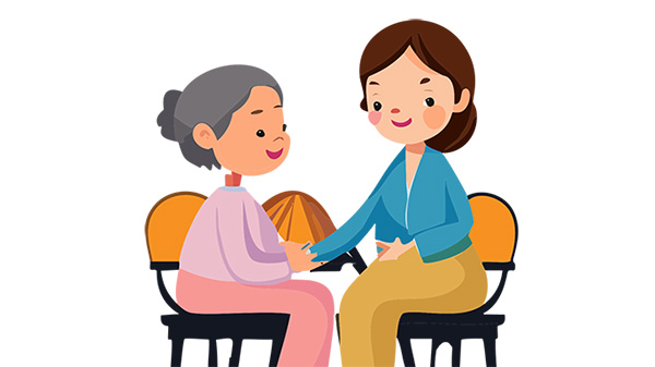 grey haired woman seated beside taller woman brown haired woman. taller younger woman touches the arm of the grey haired woman